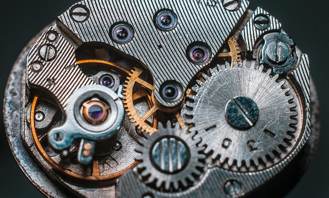Close-up view of mechanical clock gears and internal movement