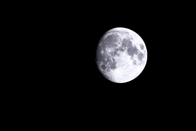 A detailed view of the moon against a dark night sky