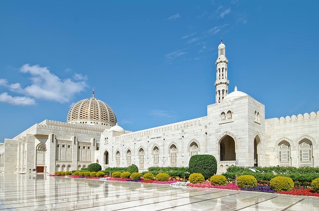 A large grand mosque with a dome and minaret
