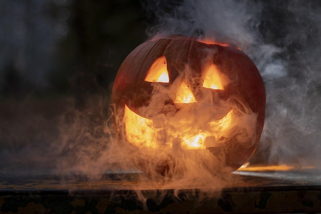 A glowing carved jack-o'-lantern emitting smoke